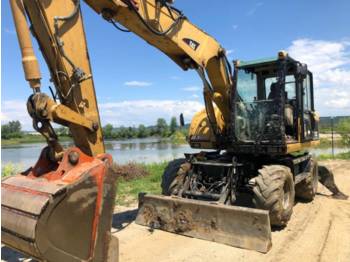 حفارة على عجلات CATERPILLAR M313C