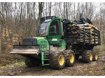 John Deere 1010E - شاحنات نقل الأخشاب في الغابات