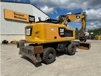 حفارة على عجلات CAT M318F: صور 3