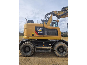 حفارة على عجلات Caterpillar M315F F: صور 3