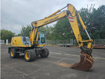 حفارة على عجلات NEW HOLLAND