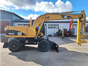حفارة على عجلات CAT M316C: صور 5