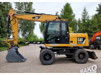 حفارة على عجلات CATERPILLAR M313D