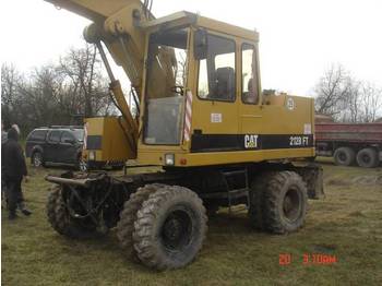 حفارة على عجلات Caterpillar 212 BFT: صور 1