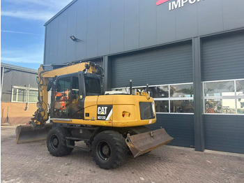 حفارة على عجلات Caterpillar M313D: صور 2 حفارة على عجلات Caterpillar M313D: صور 2