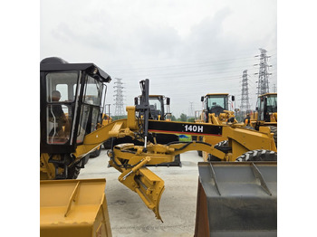 آلة تسوية الأرض Caterpillar 140H: صور 2