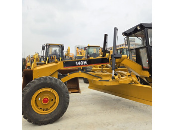 آلة تسوية الأرض Caterpillar 140H: صور 4