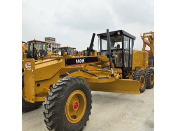 آلة تسوية الأرض Caterpillar 140H: صور 3