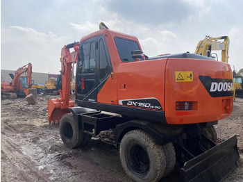 حفارة على عجلات Doosan DX150W: صور 4