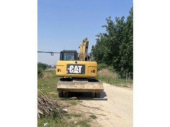 حفارة على عجلات CATERPILLAR