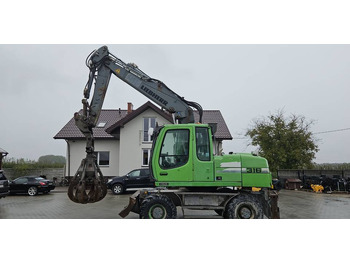 حفارة على عجلات LIEBHERR A 316