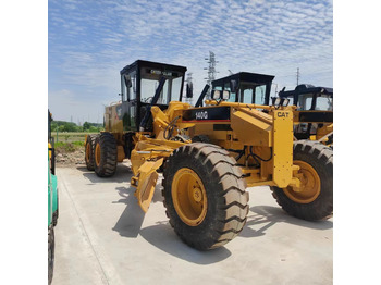 آلة تسوية الأرض CATERPILLAR