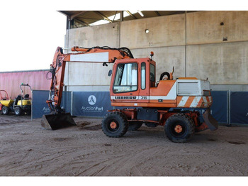 حفارة على عجلات Liebherr A316: صور 3
