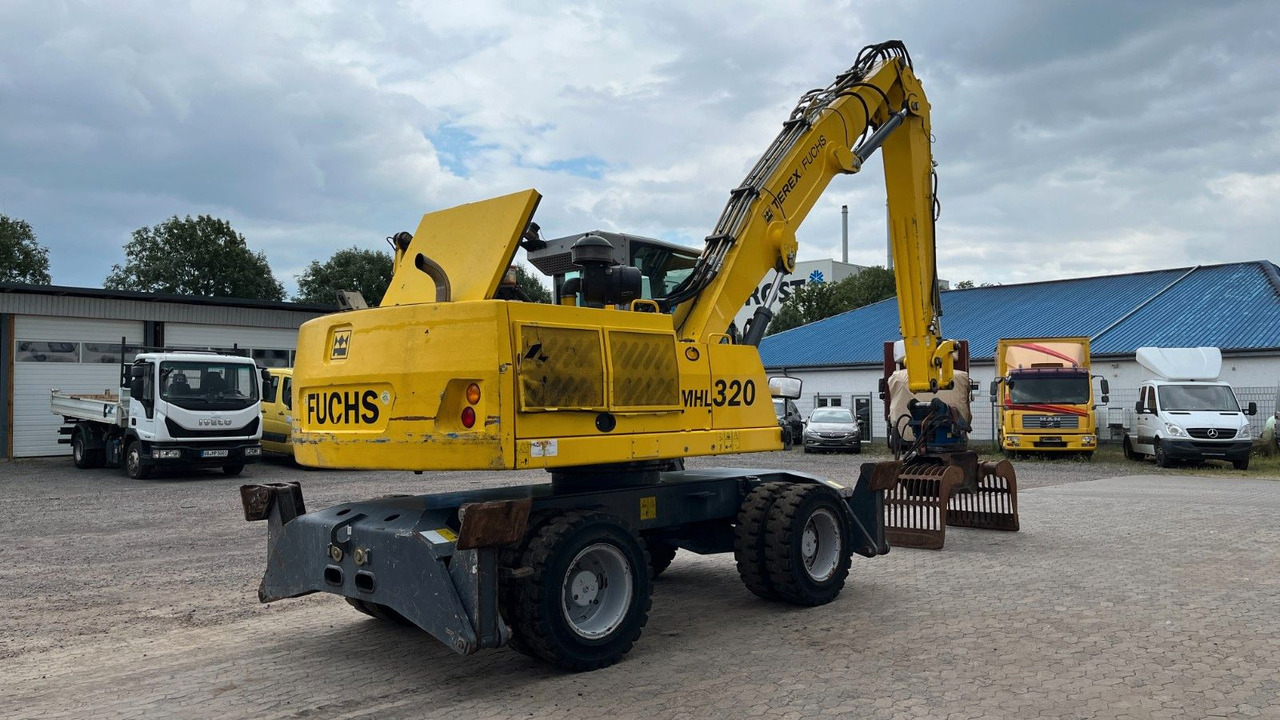 Fuchs TeRex MHL 320 D Umschlagbagger Greifer Pratzen - حفارة النقل والشحن: صور 5 Fuchs TeRex MHL 320 D Umschlagbagger Greifer Pratzen - حفارة النقل والشحن: صور 5