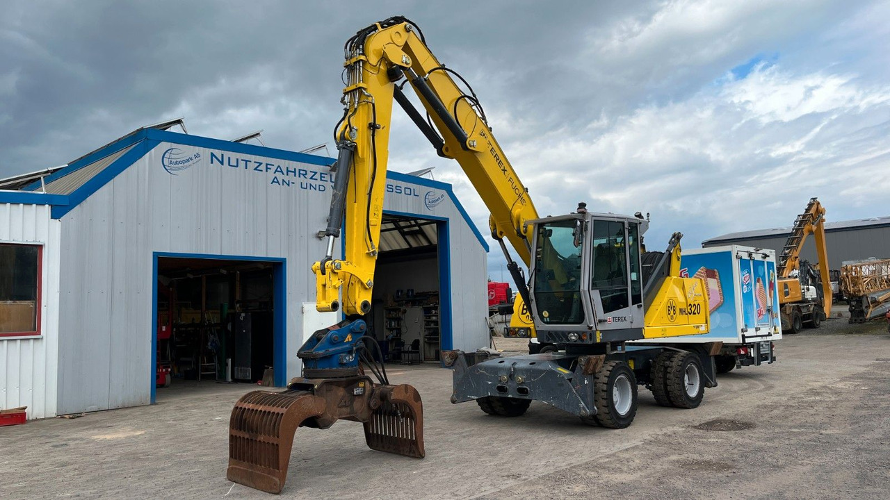 Fuchs TeRex MHL 320 D Umschlagbagger Greifer Pratzen - حفارة النقل والشحن: صور 3 Fuchs TeRex MHL 320 D Umschlagbagger Greifer Pratzen - حفارة النقل والشحن: صور 3