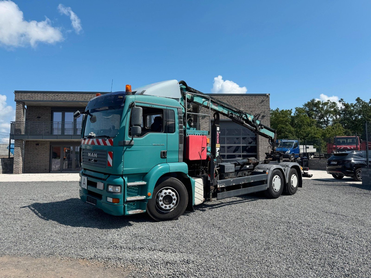 MAN TGA 26.360 Kran TeRex Multilift Fernbedienung - شاحنة ذات الخطاف, شاحنة كرين: صور 2 MAN TGA 26.360 Kran TeRex Multilift Fernbedienung - شاحنة ذات الخطاف, شاحنة كرين: صور 2