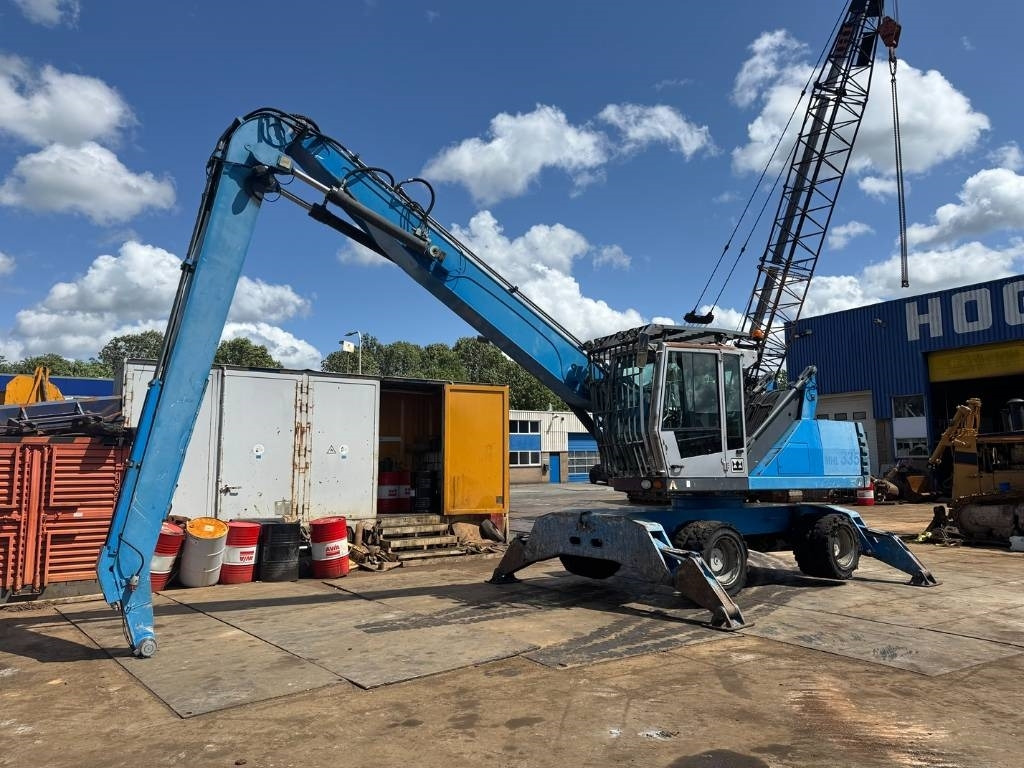 Fuchs MHL 335 - حفارة النقل والشحن: صور 2 Fuchs MHL 335 - حفارة النقل والشحن: صور 2