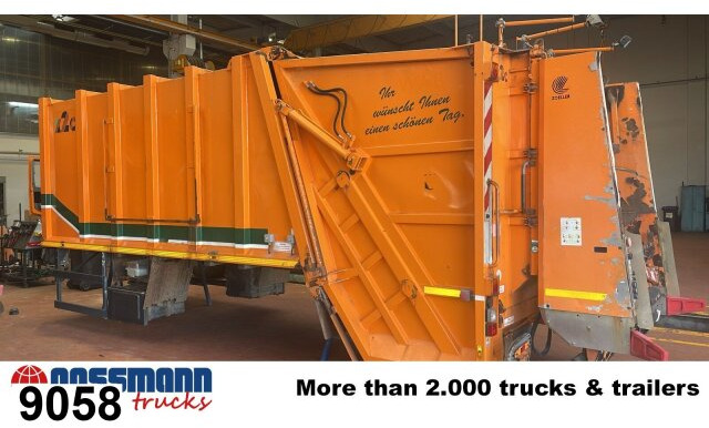 M21X2C mit Zöller Schüttung - شاحنة ذات الخطاف: صور 1 M21X2C mit Zöller Schüttung - شاحنة ذات الخطاف: صور 1