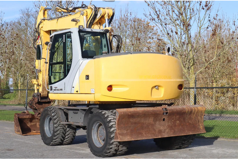 New Holland MH CITY | TILT BUCKET | QUICK COUPLER | DOZER BLADE - حفارة على عجلات: صور 3 New Holland MH CITY | TILT BUCKET | QUICK COUPLER | DOZER BLADE - حفارة على عجلات: صور 3