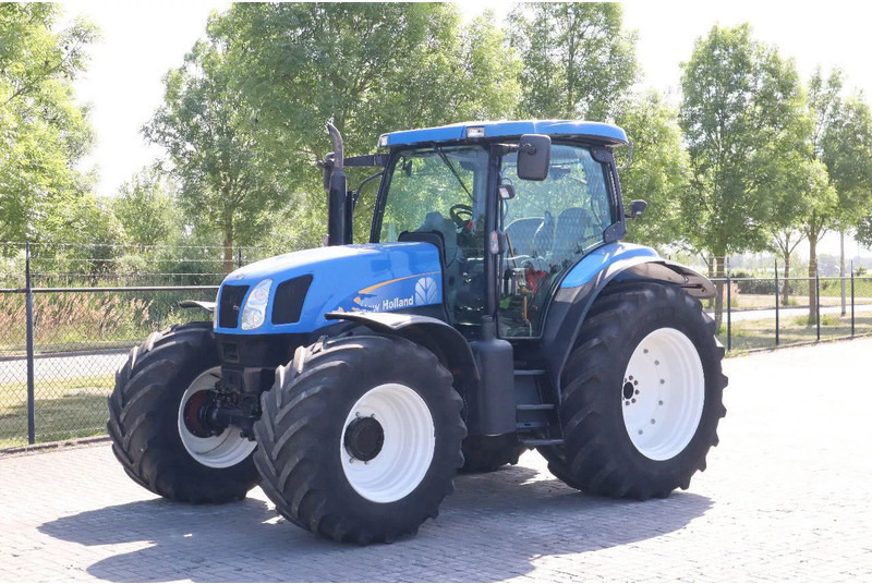 New Holland TS135A | 40 KM/H | 4X4 | SUPERSTEER - جرار: صور 1 New Holland TS135A | 40 KM/H | 4X4 | SUPERSTEER - جرار: صور 1