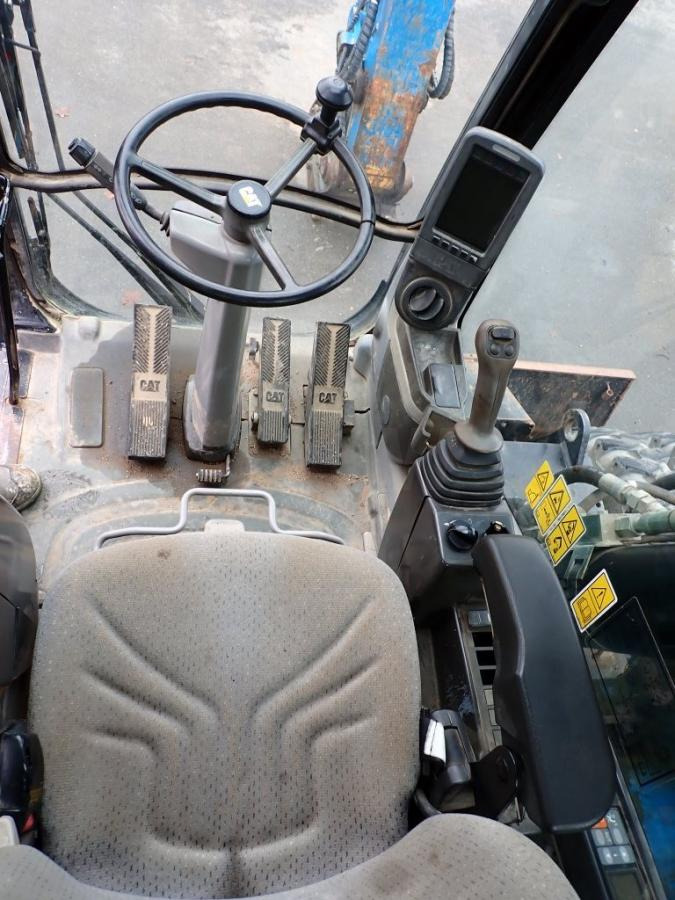 Caterpillar M322D - حفارة على عجلات: صور 5 Caterpillar M322D - حفارة على عجلات: صور 5