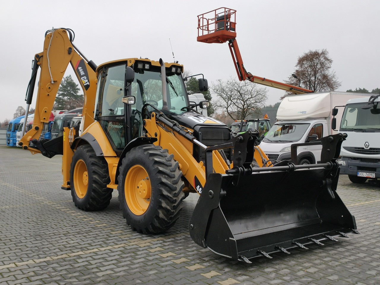 Caterpillar 444E Premier Sterowanie na Joystickach FULL OPCJA - حفار متعدد الاستخدام: صور 2 Caterpillar 444E Premier Sterowanie na Joystickach FULL OPCJA - حفار متعدد الاستخدام: صور 2