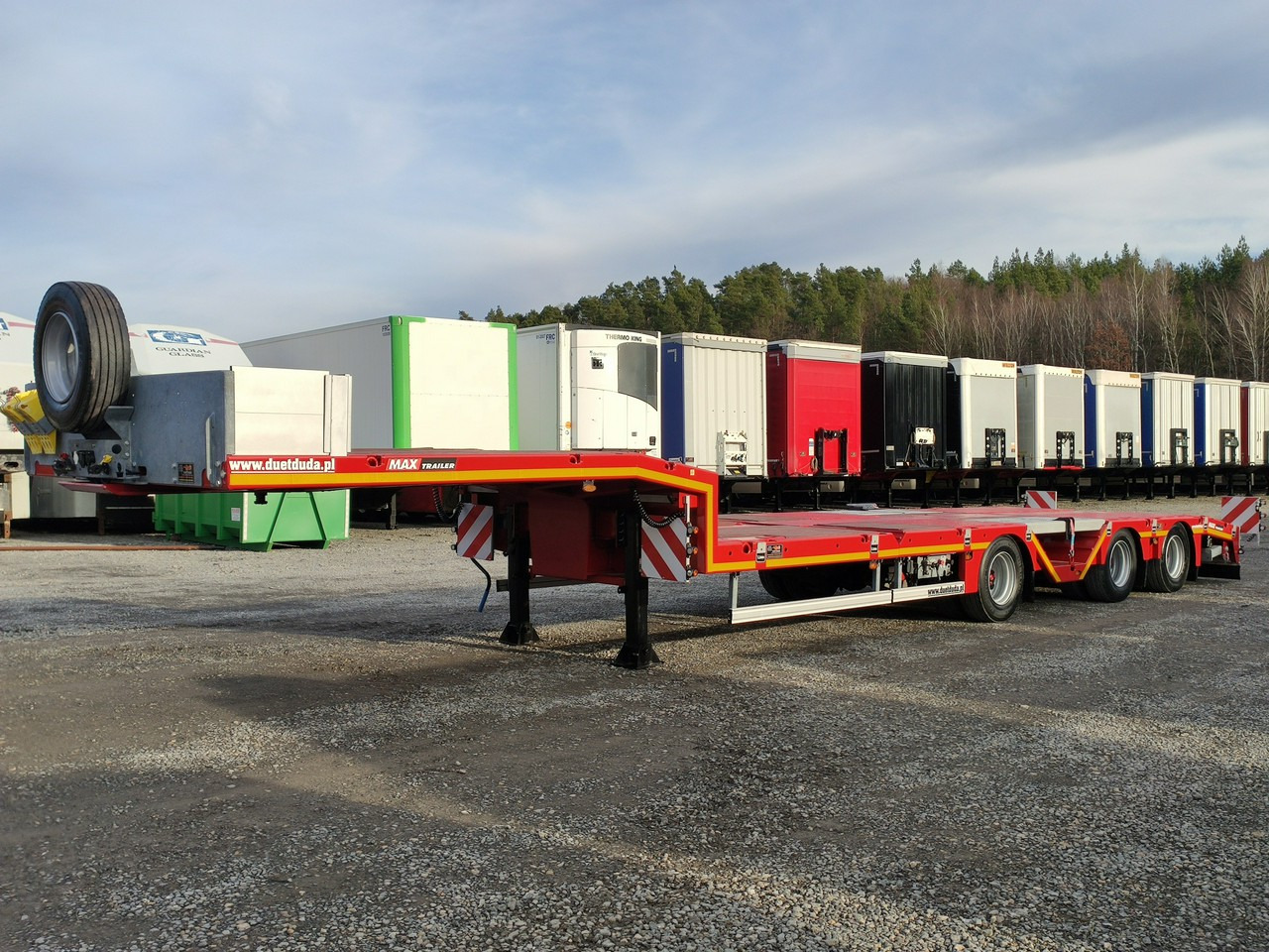 MAX Trailer 3-Osie Oś skrętna Oś Podnoszona Nooteboom - عربة مسطحة منخفضة نصف مقطورة: صور 1 MAX Trailer 3-Osie Oś skrętna Oś Podnoszona Nooteboom - عربة مسطحة منخفضة نصف مقطورة: صور 1