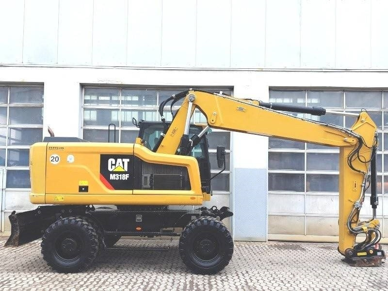 Caterpillar M 318 F - حفارة على عجلات: صور 5 Caterpillar M 318 F - حفارة على عجلات: صور 5