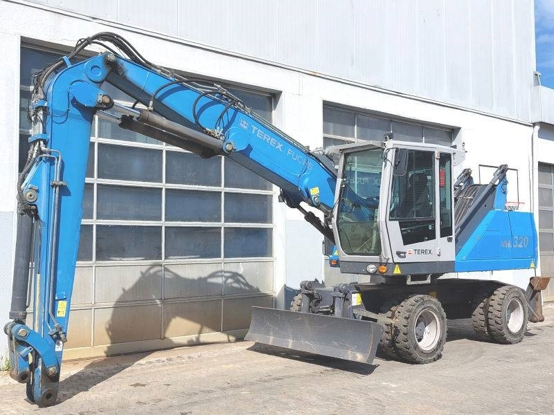 Fuchs MHL 320 D - حفارة النقل والشحن: صور 2 Fuchs MHL 320 D - حفارة النقل والشحن: صور 2