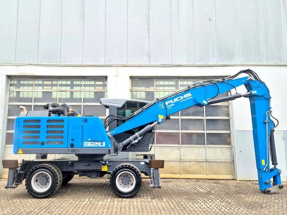 Fuchs MHL 320 F - حفارة النقل والشحن: صور 5 Fuchs MHL 320 F - حفارة النقل والشحن: صور 5