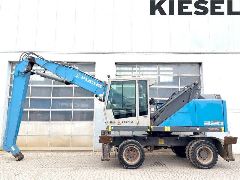 Fuchs MHL 320 F - حفارة النقل والشحن: صور 1 Fuchs MHL 320 F - حفارة النقل والشحن: صور 1
