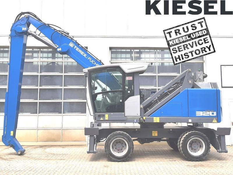 Fuchs MHL 320 F - حفارة النقل والشحن: صور 1 Fuchs MHL 320 F - حفارة النقل والشحن: صور 1