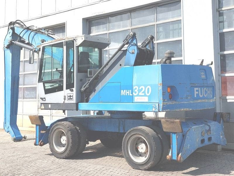 Fuchs MHL 320 F - حفارة النقل والشحن: صور 3 Fuchs MHL 320 F - حفارة النقل والشحن: صور 3
