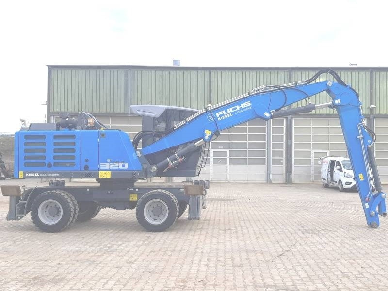Fuchs MHL 320 F - حفارة النقل والشحن: صور 4 Fuchs MHL 320 F - حفارة النقل والشحن: صور 4