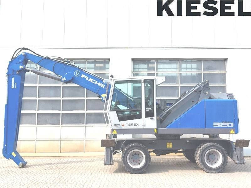 Fuchs MHL 320 F - حفارة النقل والشحن: صور 1 Fuchs MHL 320 F - حفارة النقل والشحن: صور 1