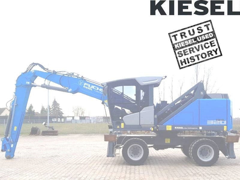 Fuchs MHL 320 F - حفارة النقل والشحن: صور 1 Fuchs MHL 320 F - حفارة النقل والشحن: صور 1