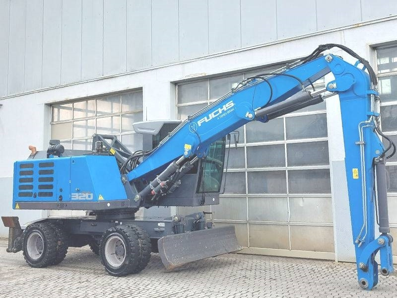 Fuchs MHL 320 F - حفارة النقل والشحن: صور 4 Fuchs MHL 320 F - حفارة النقل والشحن: صور 4