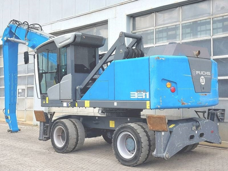 Fuchs MHL 331 F - حفارة النقل والشحن: صور 3 Fuchs MHL 331 F - حفارة النقل والشحن: صور 3