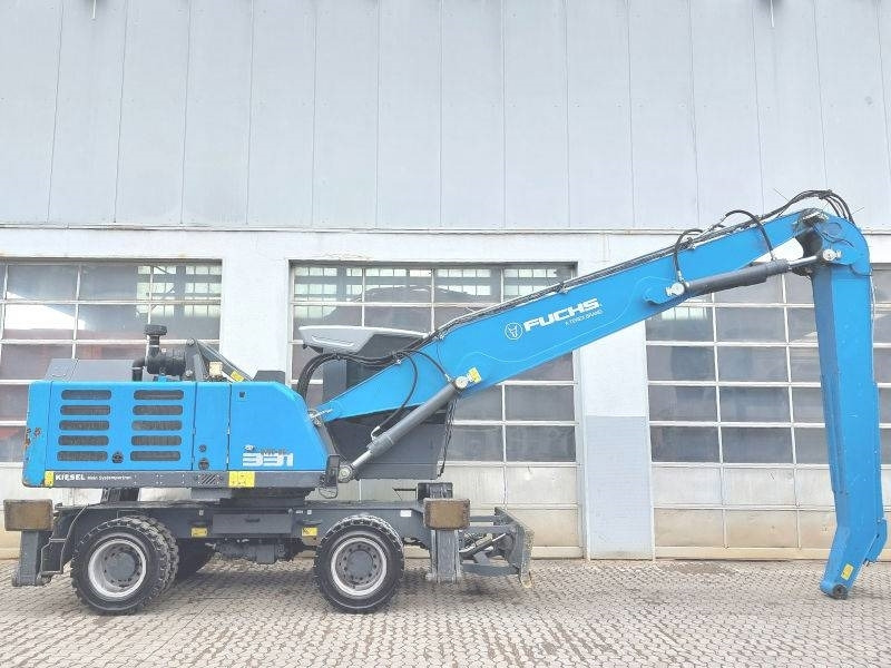 Fuchs MHL 331 F - حفارة النقل والشحن: صور 5 Fuchs MHL 331 F - حفارة النقل والشحن: صور 5