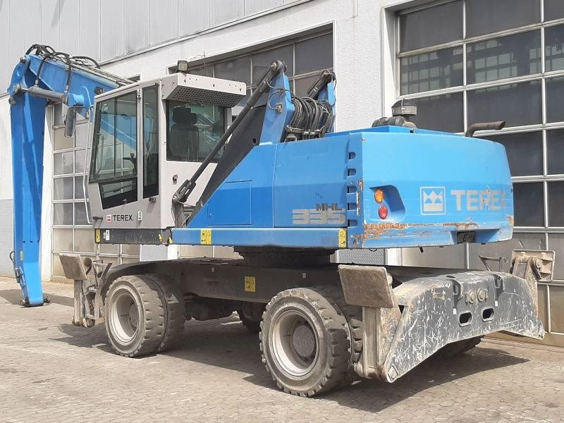 Fuchs MHL 335 E - حفارة النقل والشحن: صور 3 Fuchs MHL 335 E - حفارة النقل والشحن: صور 3