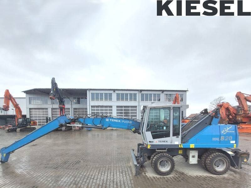 Fuchs MHL 820 D Elektro - حفارة النقل والشحن: صور 1 Fuchs MHL 820 D Elektro - حفارة النقل والشحن: صور 1