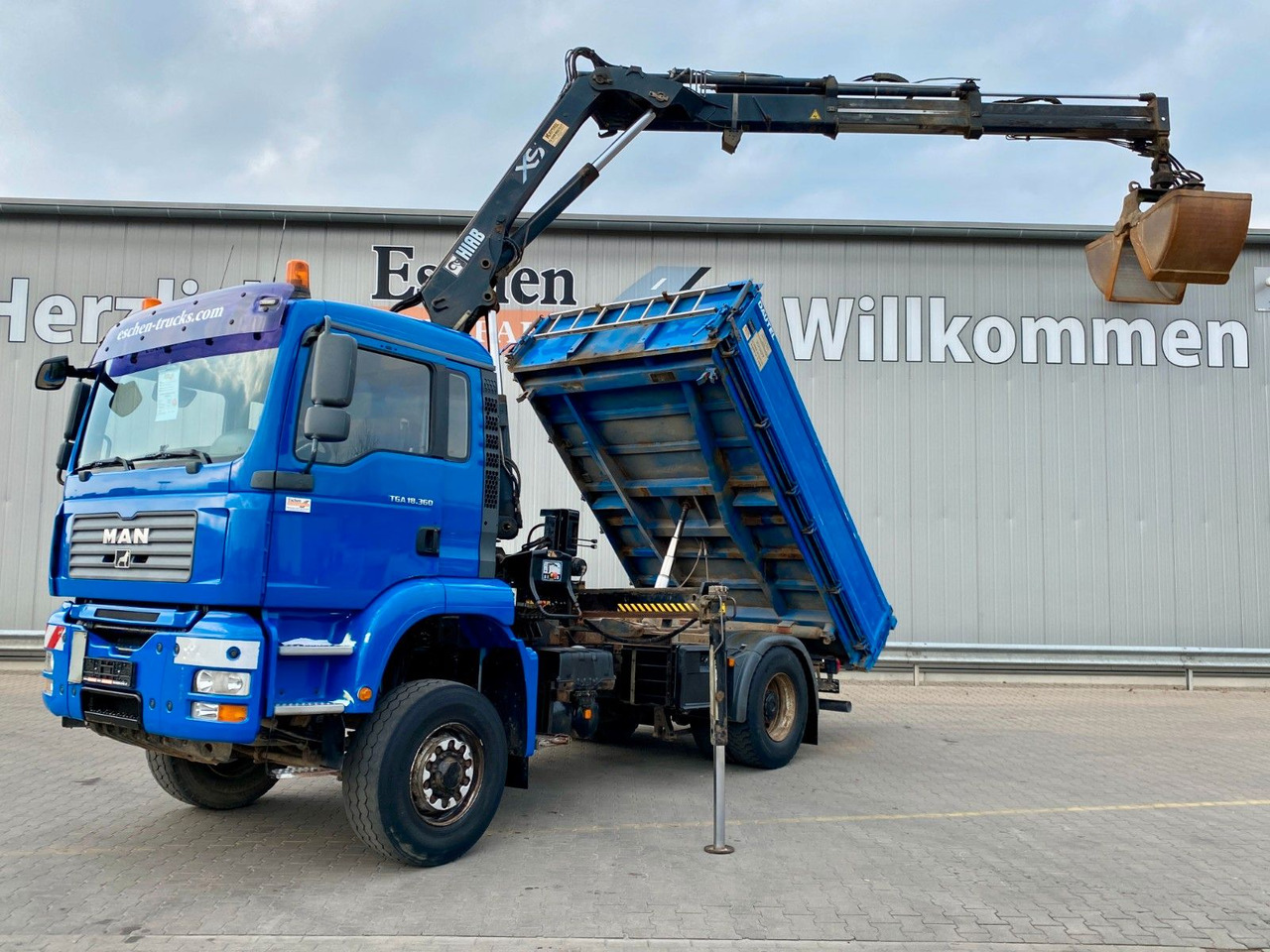 MAN TGA 18.360 4x4H BL*HIAB 122 BS-2*Dautel 3-Seiten MAN TGA 18.360 4x4H BL*HIAB 122 BS-2*Dautel 3-Seiten - قلابات, شاحنة كرين: صور 1 MAN TGA 18.360 4x4H BL*HIAB 122 BS-2*Dautel 3-Seiten MAN TGA 18.360 4x4H BL*HIAB 122 BS-2*Dautel 3-Seiten - قلابات, شاحنة كرين: صور 1