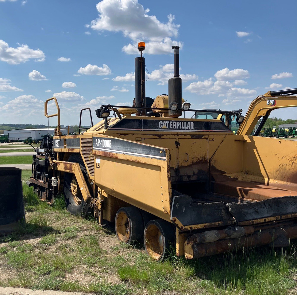 Caterpillar AP1000B - العامل بالقار: صور 1 Caterpillar AP1000B - العامل بالقار: صور 1