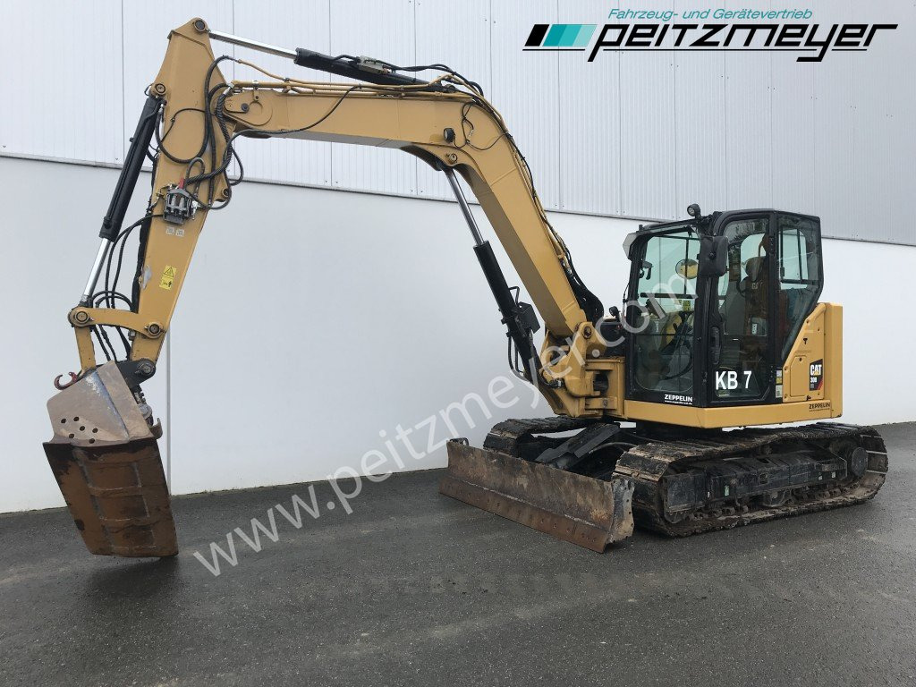 CAT Kurzheckbagger 308-07 ECR Powertilt - حفارة مصغرة: صور 1 CAT Kurzheckbagger 308-07 ECR Powertilt - حفارة مصغرة: صور 1