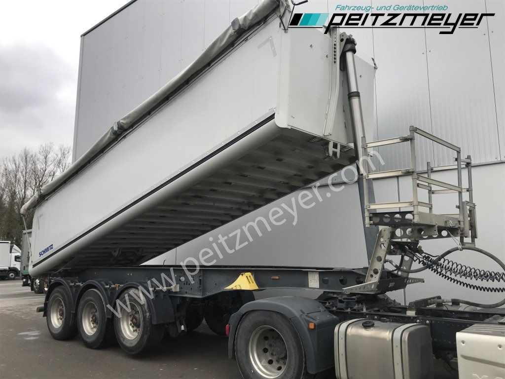 SCHMITZ 3 Achs Kippauflieger SKI24SL7.2 Verschleißboden 5mm neu Alu - Stahl, ca. 26 m³, Getreideschieber - قلابة نصف مقطورة: صور 3 SCHMITZ 3 Achs Kippauflieger SKI24SL7.2 Verschleißboden 5mm neu Alu - Stahl, ca. 26 m³, Getreideschieber - قلابة نصف مقطورة: صور 3