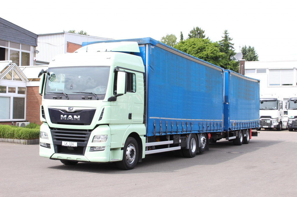 MAN TGX 26.460 Retarder Jumbo-Zug 120M3 Durchlade - شاحنة ستارة: صور 1 MAN TGX 26.460 Retarder Jumbo-Zug 120M3 Durchlade - شاحنة ستارة: صور 1