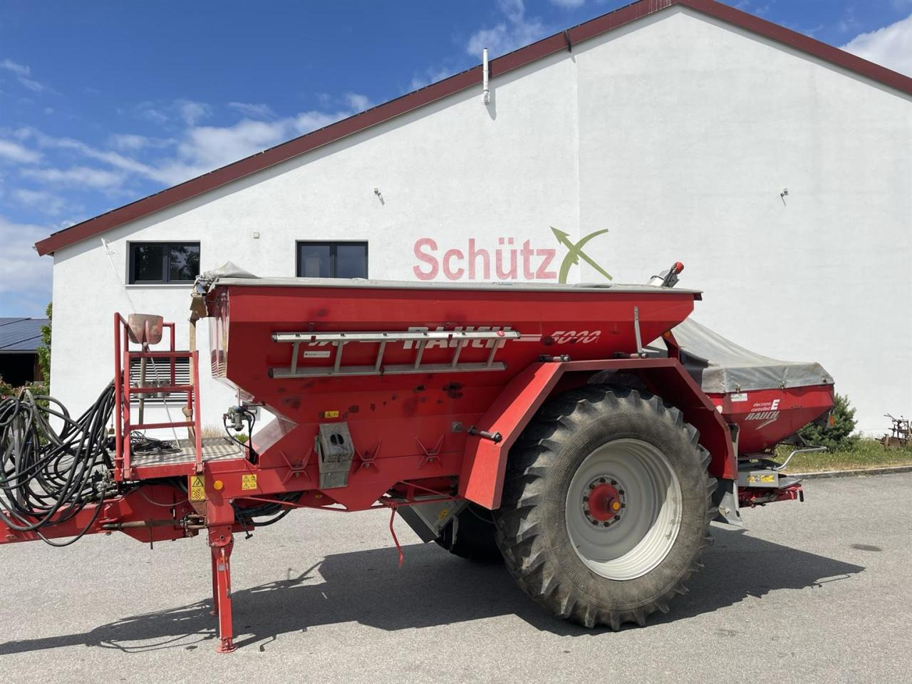 Rauch TWS 5000 Düngerwagen mit Lenkung und Streuer Axera H-EMC - آلة رش الأسمدة: صور 2 Rauch TWS 5000 Düngerwagen mit Lenkung und Streuer Axera H-EMC - آلة رش الأسمدة: صور 2