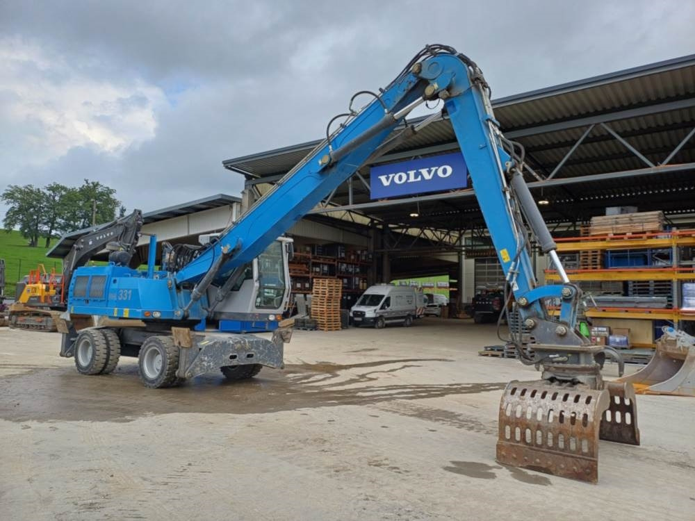 Fuchs MHL 331 - حفارة النقل والشحن: صور 1 Fuchs MHL 331 - حفارة النقل والشحن: صور 1