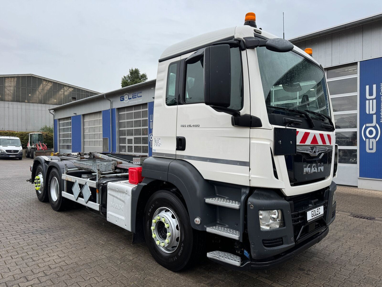 MAN TGS 26.400 6x2-4 Abrollkipper Lift-Lenkachse - شاحنة ذات الخطاف, شاحنة كرين: صور 1 MAN TGS 26.400 6x2-4 Abrollkipper Lift-Lenkachse - شاحنة ذات الخطاف, شاحنة كرين: صور 1