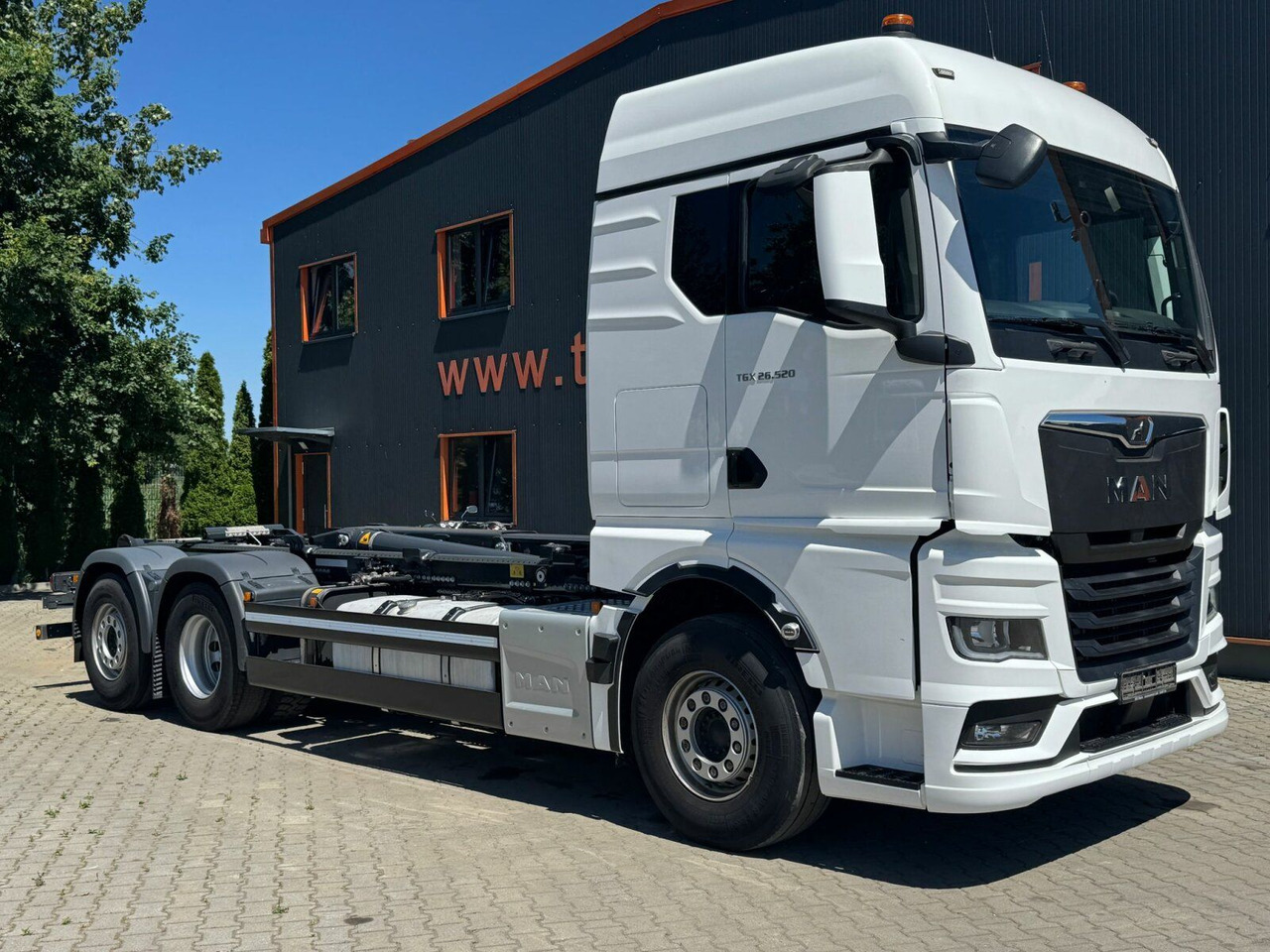 MAN TGX 26.520 6x2 Abrollkipper MEILLER RS 21.70 - شاحنة ذات الخطاف: صور 1 MAN TGX 26.520 6x2 Abrollkipper MEILLER RS 21.70 - شاحنة ذات الخطاف: صور 1